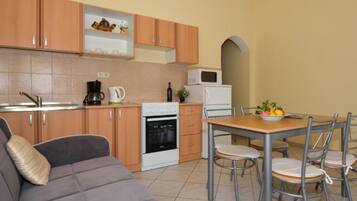 Apartment (Two Bedroom Apartment with Balcony A1) | Private kitchen | Fridge