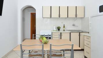 Apartment (Two Bedroom Apartment with Balcony A3) | Private kitchen | Fridge