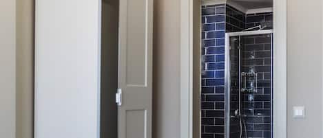 Shower, towels, soap, toilet paper