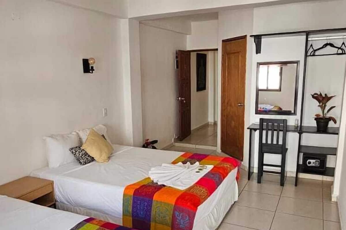 Habitación cuádruple clásica | Ropa de cama