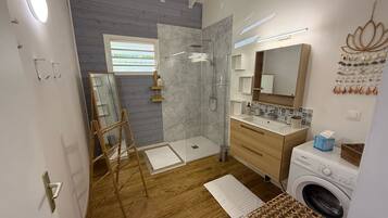 Shower, hair dryer, towels, soap