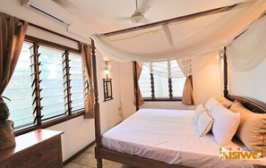 Family Apartment, Garden View | Hypo-allergenic bedding, in-room safe, iron/ironing board, free WiFi