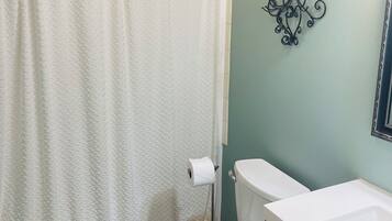 Hair dryer, towels, soap, toilet paper