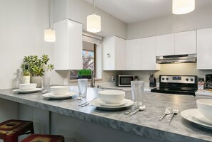 Condo, Multiple Beds, Patio, Garden View (220 Peterson St. (Unit 3,4,7,8)) | Private kitchen | Fridge, microwave, oven, stovetop - Peterson Flats Urban Group Getaway (Fort Collins)