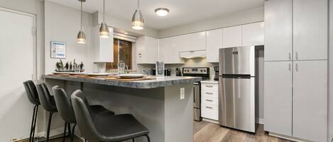 Condo, Multiple Beds, Patio, Garden View (220 Peterson St. (Unit 3,4,7,8)) | Private kitchen | Fridge, microwave, oven, stovetop