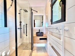 Shower, hair dryer, towels, toilet paper