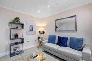 Family House | Living area | 42-inch Smart TV with digital channels, Netflix, streaming services - Stylish 4 Bedroom Home in Brightside Ave (Staines)