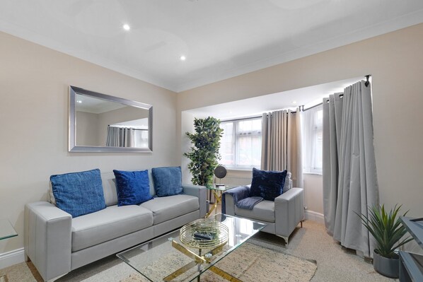 Family House | Living area | 42-inch Smart TV with digital channels, Netflix, streaming services