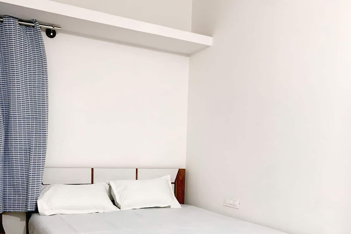 Deluxe Double Room, Balcony, City View | Desk, laptop workspace