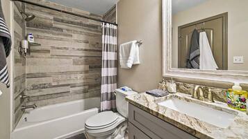 Hair dryer, towels, soap, shampoo