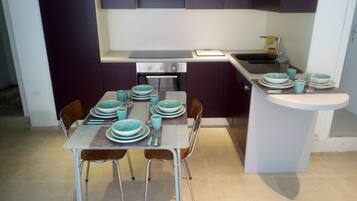 Apartment, 1 Bedroom, Fireplace | Dining room