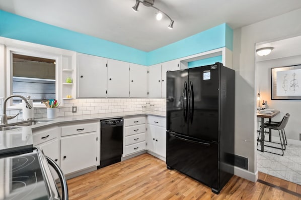 Enjoy meals in the kitchen with a dining area nearby.