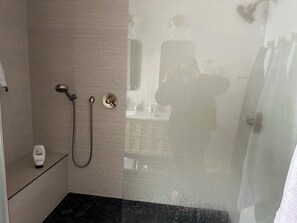 Shower, hair dryer, towels, soap