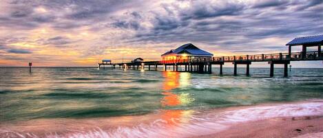 On the beach, sun-loungers, beach towels