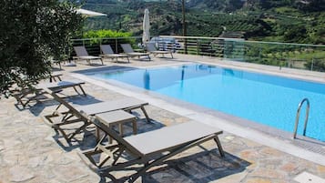 Seasonal outdoor pool, pool umbrellas