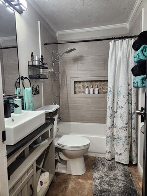 Hair dryer, towels, soap, toilet paper