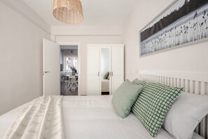 2 bedrooms, travel crib, WiFi, bed sheets