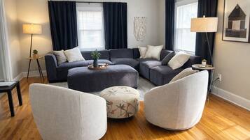 House, Multiple Beds, Patio, Garden View (915 23rd St - Group) | Living area | 50-inch flat-screen TV with digital channels