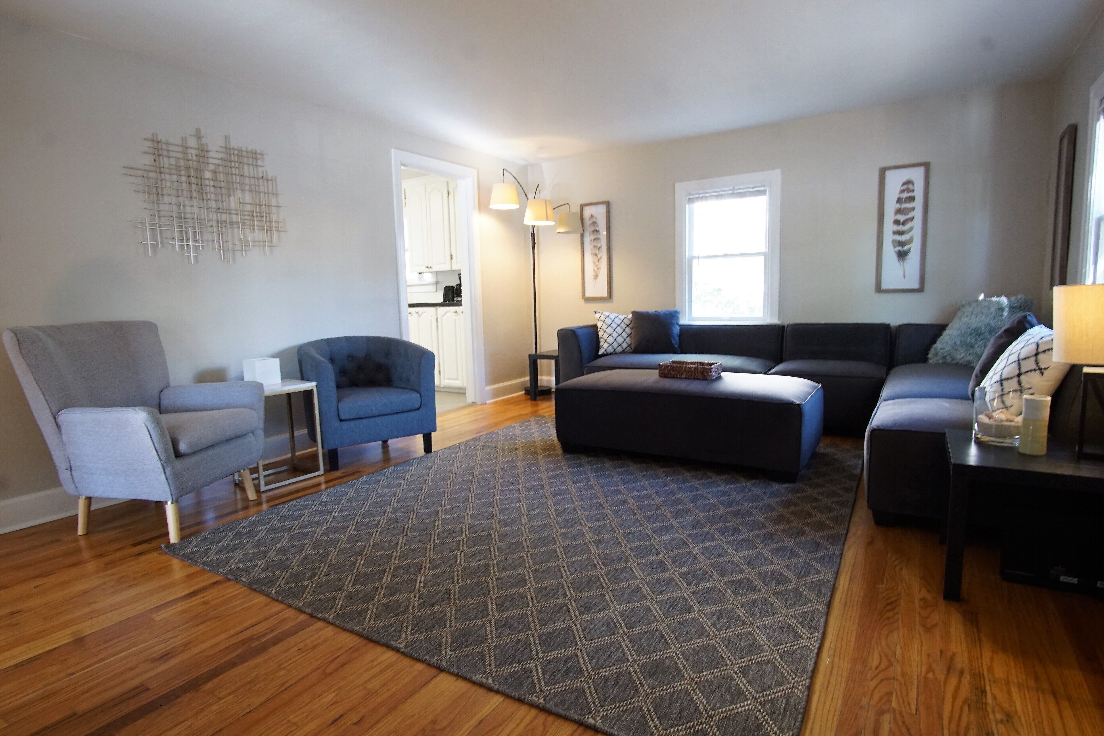 House, Multiple Beds, Patio, Garden View (915 23rd St - Group) | Living area | 50-inch flat-screen TV with digital channels