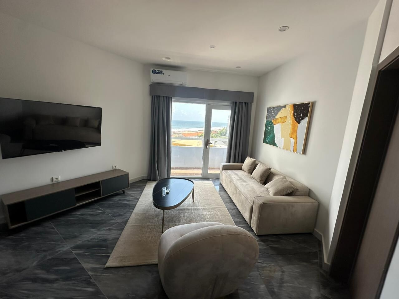 Suite Exclusive, balcone, vista oceano | Area soggiorno | Giocattoli