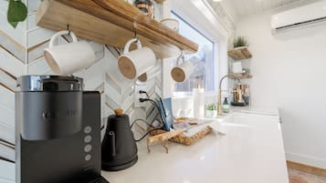Microwave, coffee/tea maker, toaster, cookware/dishes/utensils