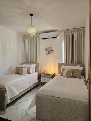 2 quartos, ferros/tábuas de passar roupa, Wi-Fi, roupa de cama