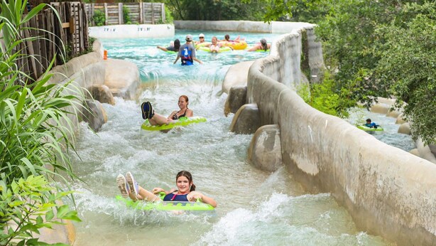 A water park with a lazy river and various water slides. - 🌟 Perfect Stay for BMT Graduation • 5 Min to Lackland AFB & SeaWorld (San Antonio)