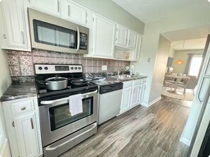 Fridge, microwave, oven, stovetop - Modern 2BR Townhome, 1.5 Baths, Ideal for 30+ Day Stays, Workspace + Parking (Evansville)