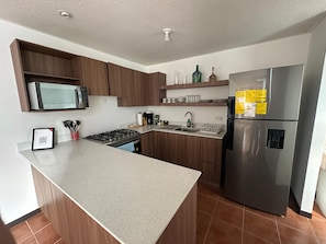 Microondas, horno y parrilla de estufa