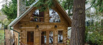 Villa Lake Waterfront Estate with a Log Cabin