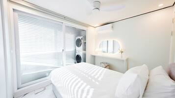 2 bedrooms, desk, iron/ironing board, travel crib