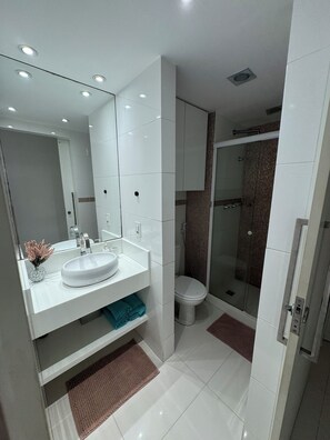 Shower, towels, toilet paper