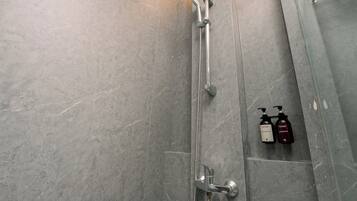 Shower, towels, soap, shampoo