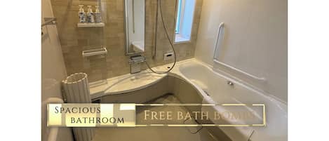 Separate bathtub and shower, free toiletries, hair dryer, slippers