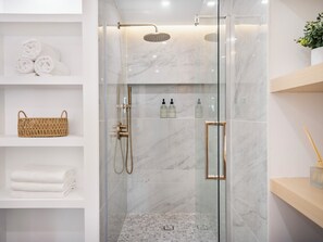 Shower, hair dryer, towels, soap