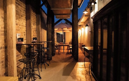 Standard Room, 1 Queen Bed, Kitchenette | Courtyard view. The Staging Post