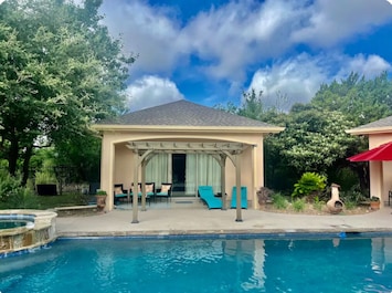 View of the pool/patio area. Feel like you are in a private resort!