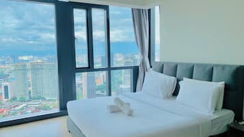 Superior Suite, Multiple Beds, City View | In-room safe, desk, laptop workspace, soundproofing
