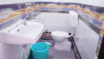 Single Room | Bathroom | Shower, rainfall showerhead, slippers, towels