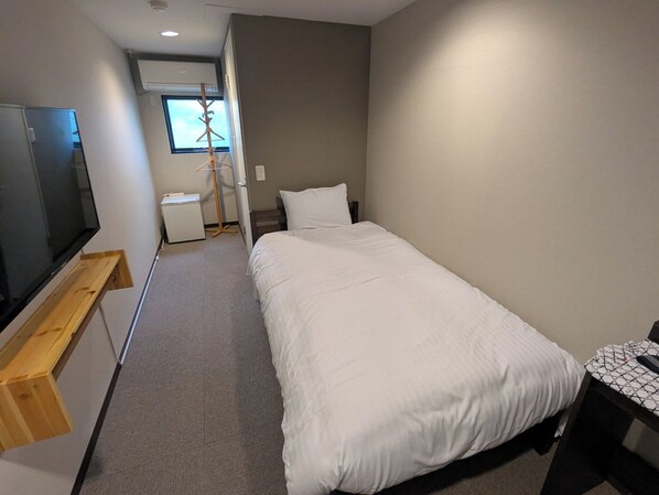 Chambre Simple Économique | Wi-Fi gratuit, draps fournis