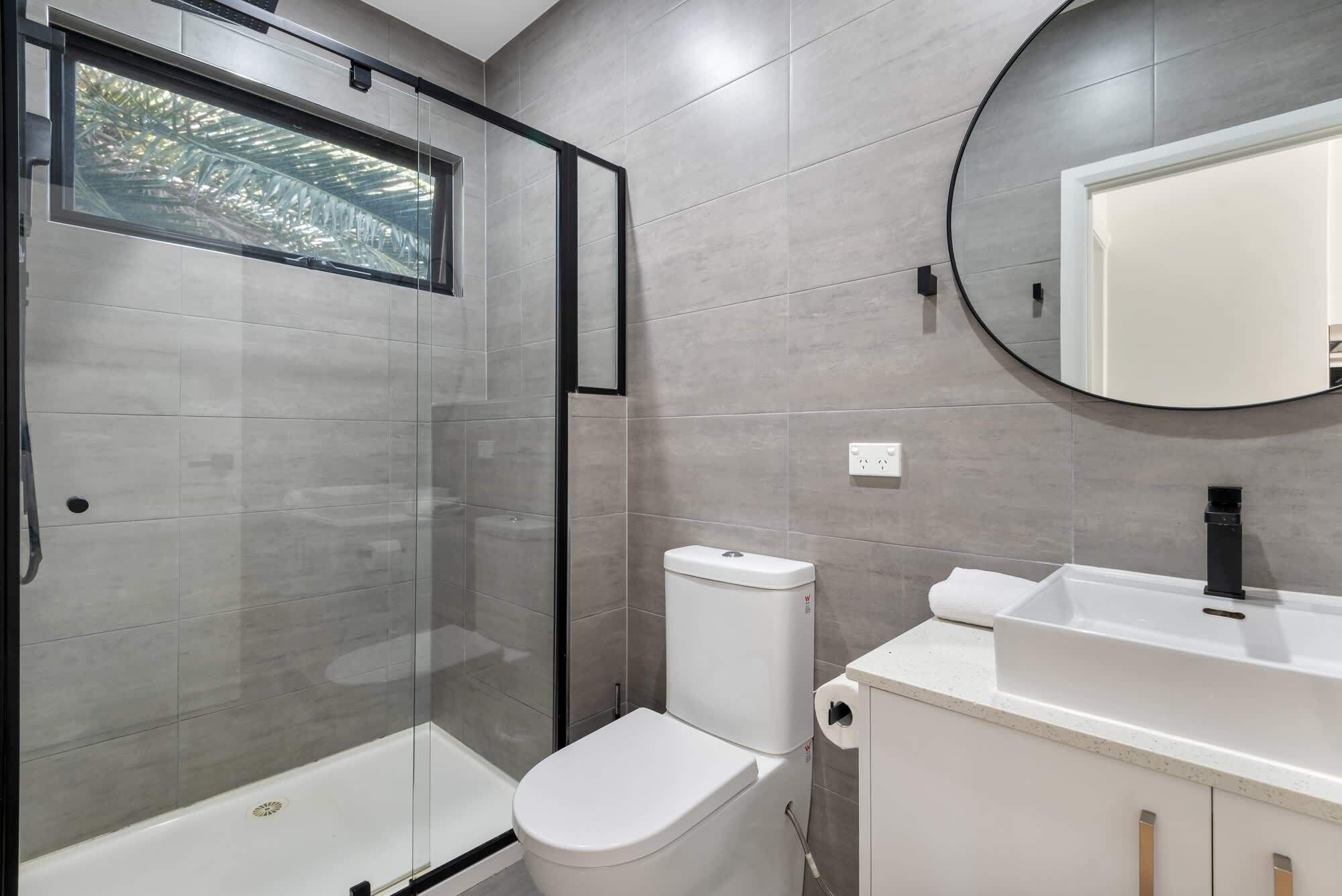 Shower, hair dryer, towels, shampoo