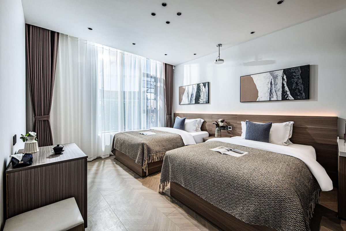Habitación clásica con 2 camas individuales, vista al mar | Wifi gratis