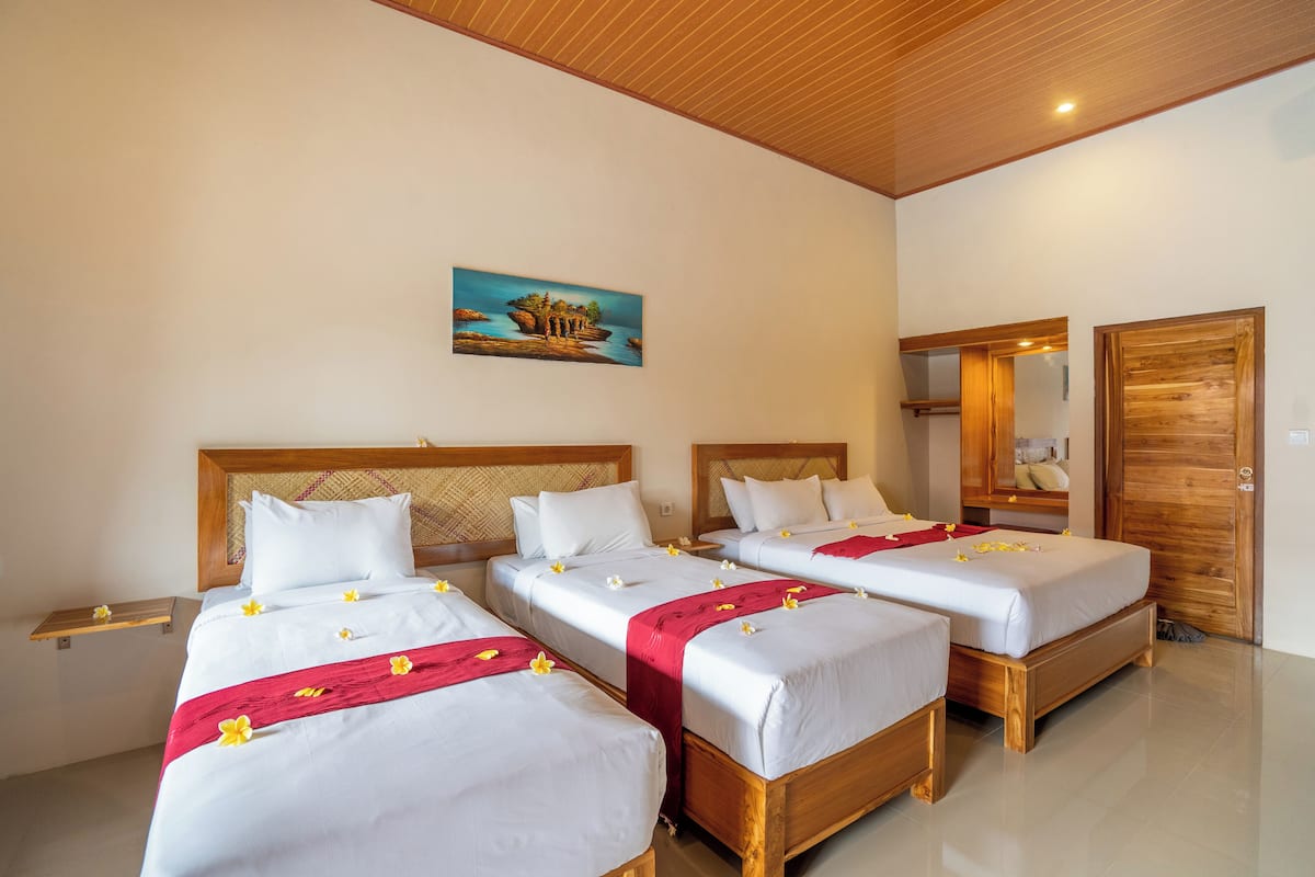 Deluxe Quadruple Room, Balcony, Pool View | Free WiFi