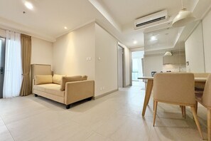 Deluxe Apartment, 2 Bedrooms, Kitchen, City View | Living area | 42-inch flat-screen TV with cable channels - Premium Luxury Menara Jakarta Residence (Jakarta)