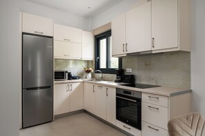 Superior Apartment, 2 Bedrooms, Kitchen, Ground Floor | Private kitchen | Electric kettle - The 7 Suites, An Elegant Living in Ipsos by Konnect (Corfu)