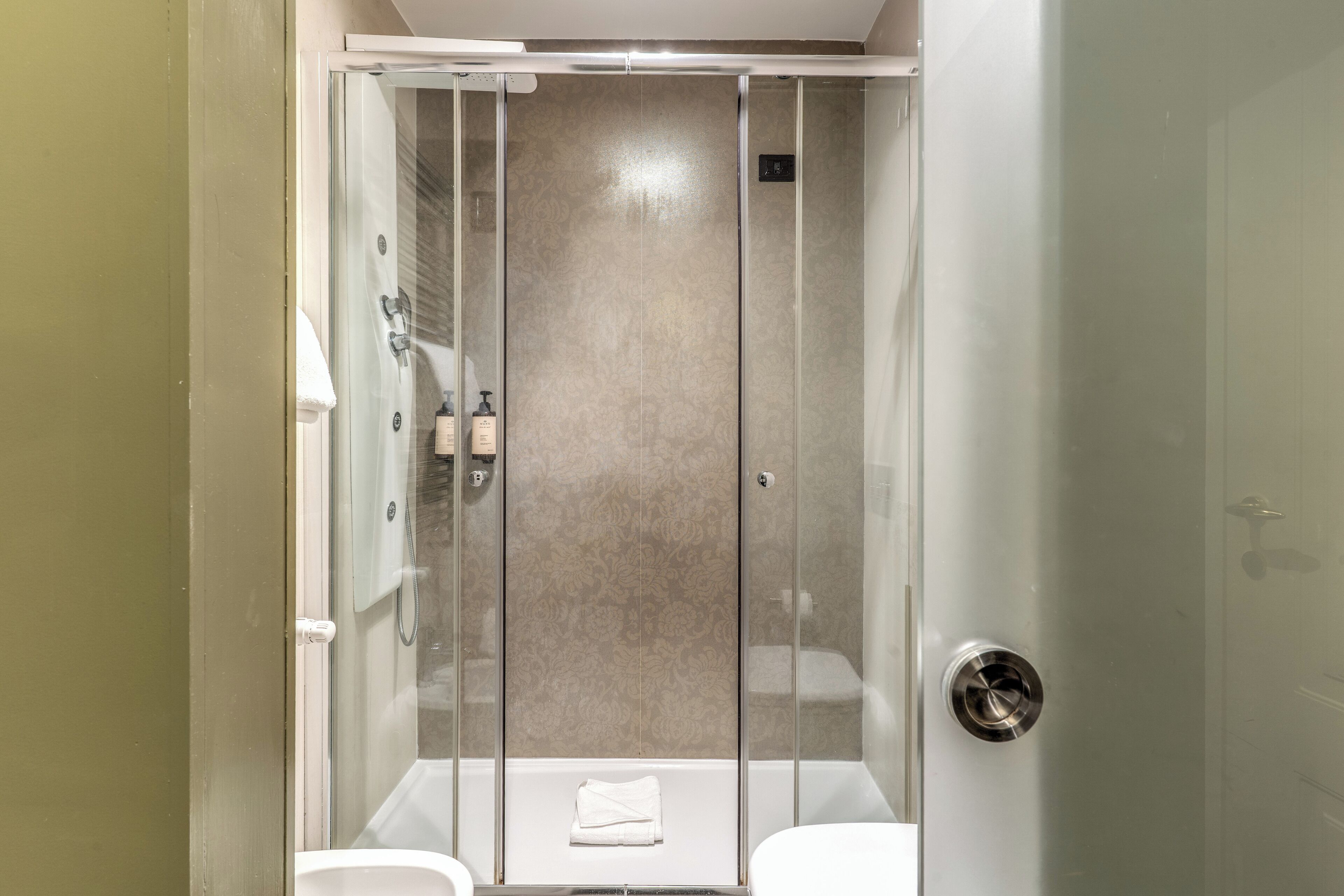 Shower, free toiletries, hair dryer, slippers