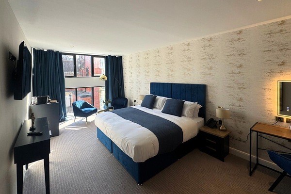 Luxe beddengoed, een gratis minibar, een kluis op de kamer