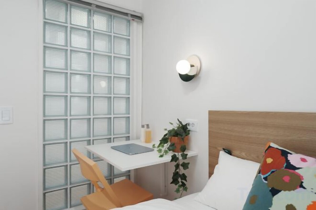 Premium bedding, pillowtop beds, laptop workspace, WiFi (free)