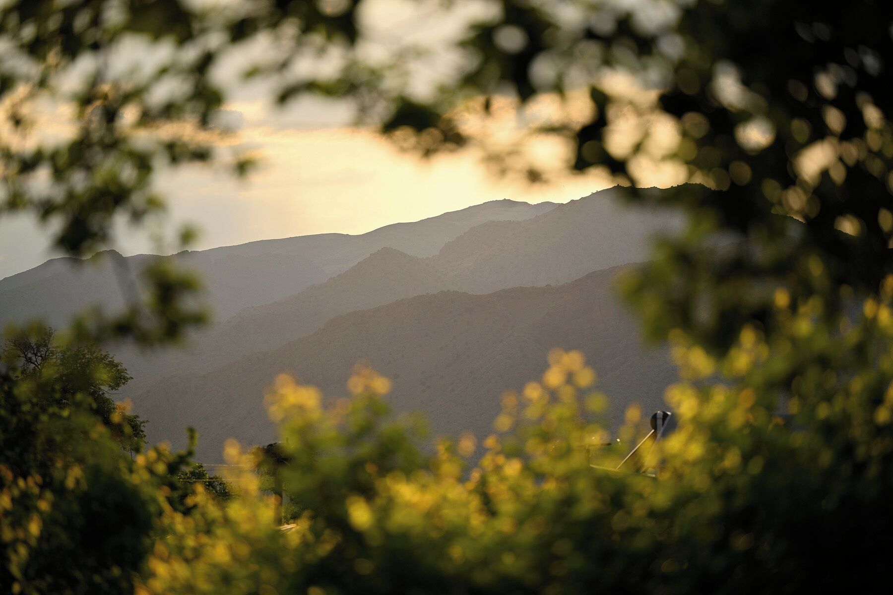 A mountain landscape with a clear sky.