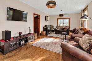 Smart TV, fireplace, DVD player, books